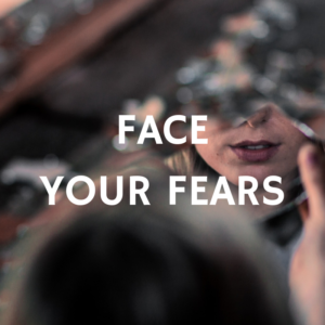 Face your Fears - woman looks into the mirror