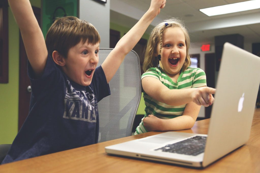 Children Win - Boy and Girl are Excited