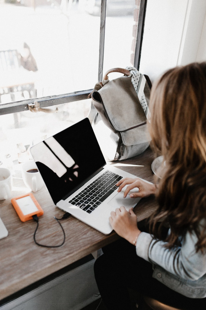 Diligent Woman Working on Laptop