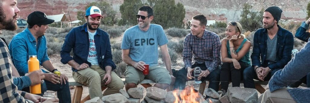 Group of People by Fireplace