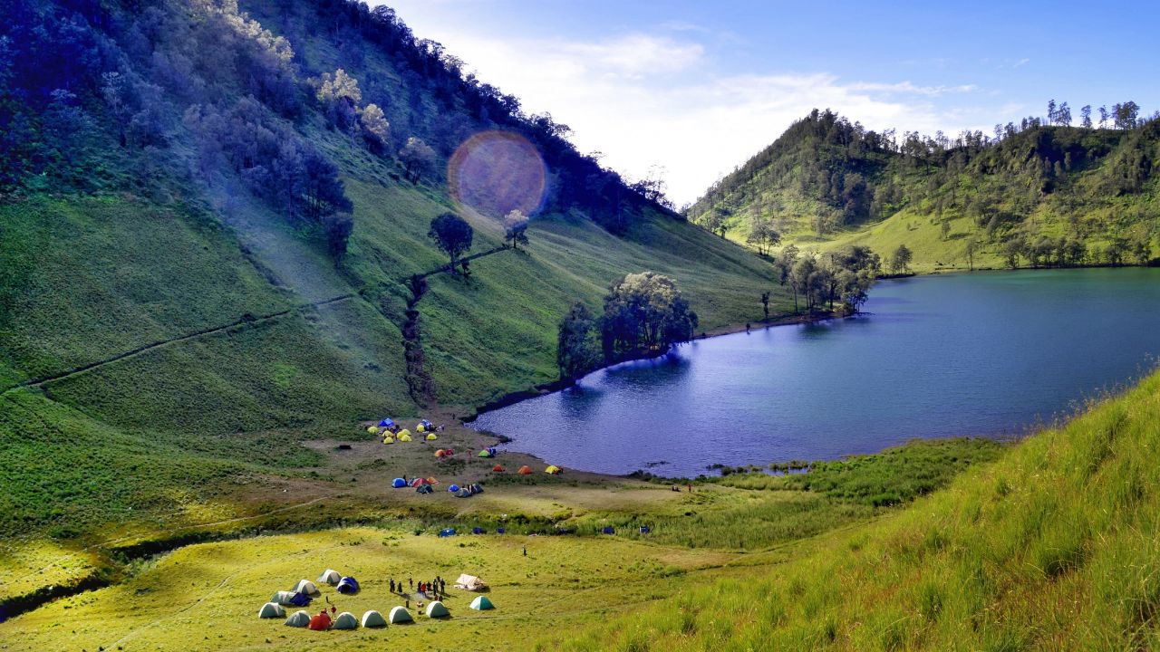 How to Live a Life of Purpose as a Christian 7 Keys to Discovering Your God-Given Calling - Haly Ministries (on photo: lake hills and tents by the lake)