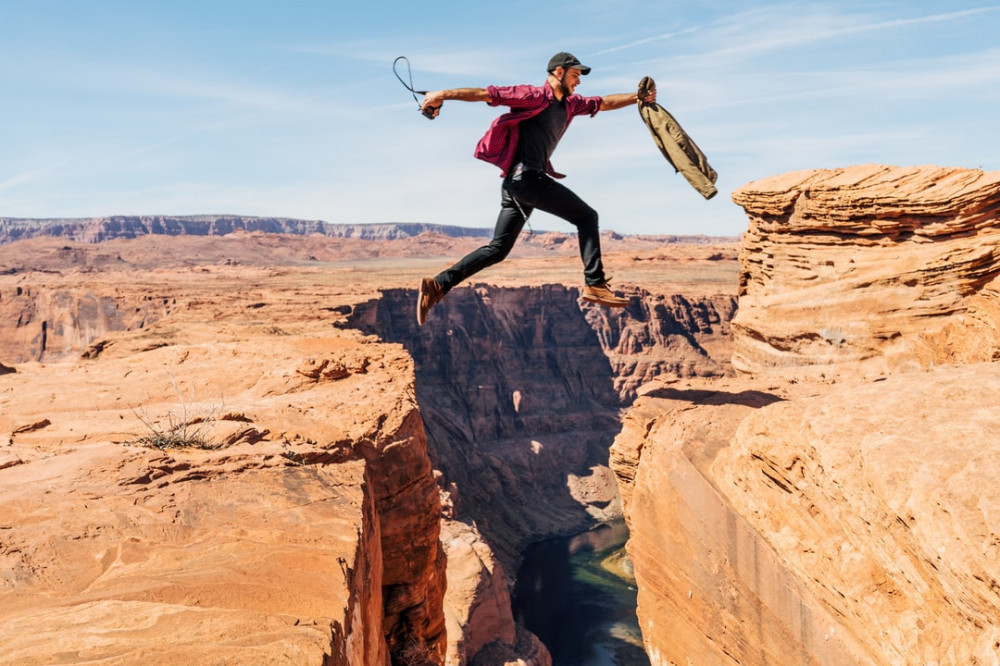 Man Jumps Over the Canyon