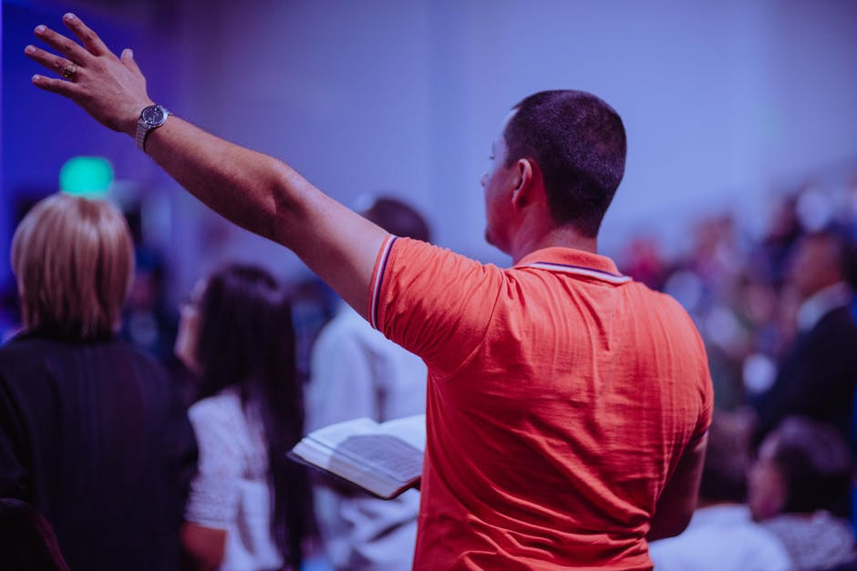 Man Raised Hand in Worship