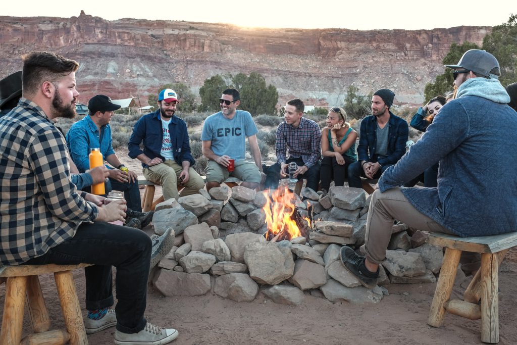 People Camping Around Fire