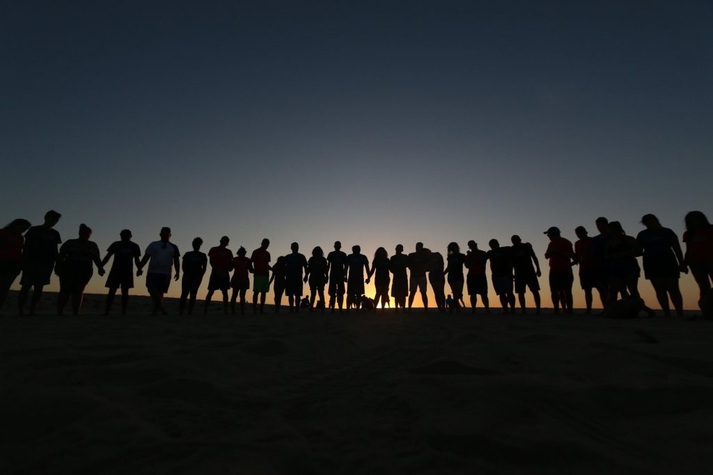 People Praying Holding Hands