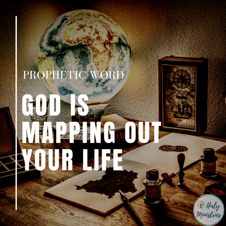 Prophetic Word God Mapping Out Your Life. Picture of World Globe Drawing Book with a Map Drawn on it