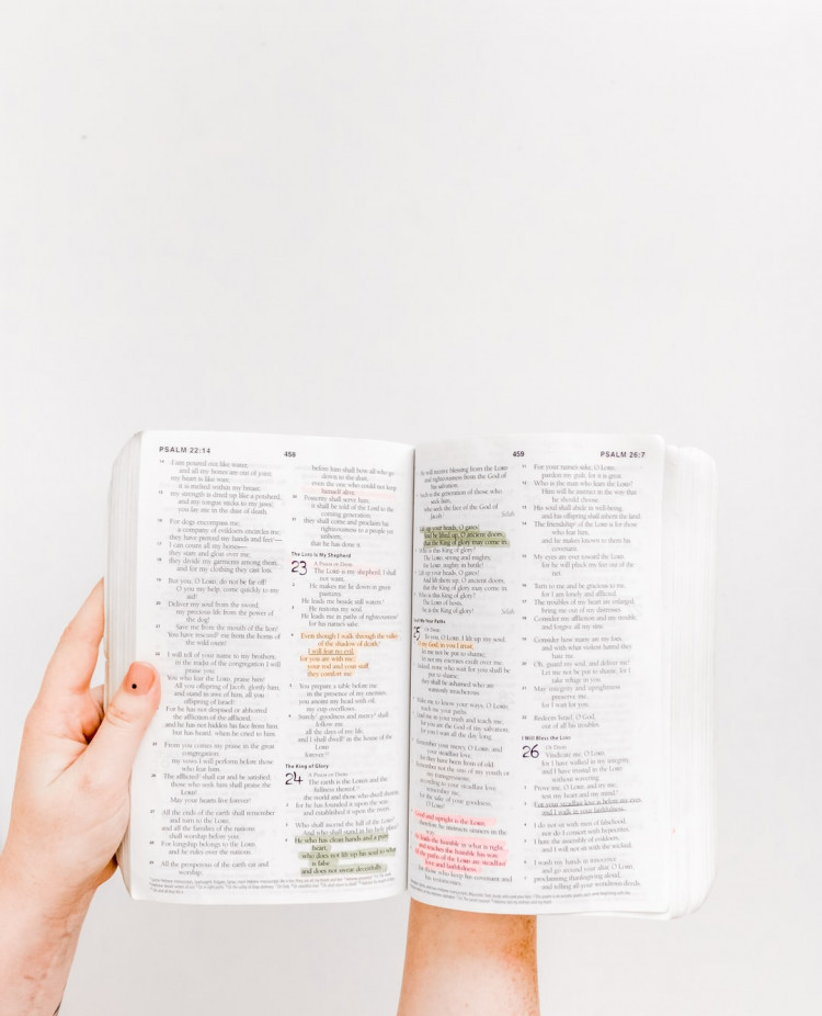 Study the Word of God - Bible Opened with Highlighted Verses