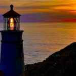 The Divine Reboot A Prophetic Call to Renewal - Haly Ministries (on photo: lighthouse and sun on horizon)