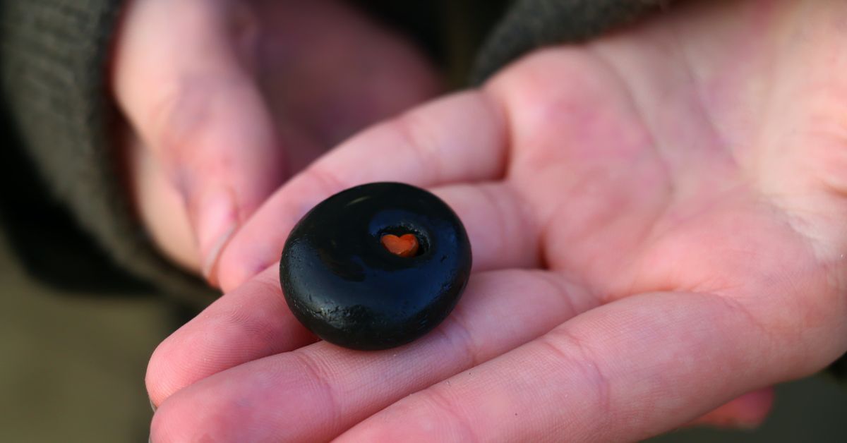 Walking Through Life’s Darkest Shadows Psalm 23 - Haly Ministries (a black stone with a heart in the middle)